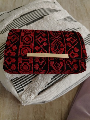 Questa elegante borsa - , a